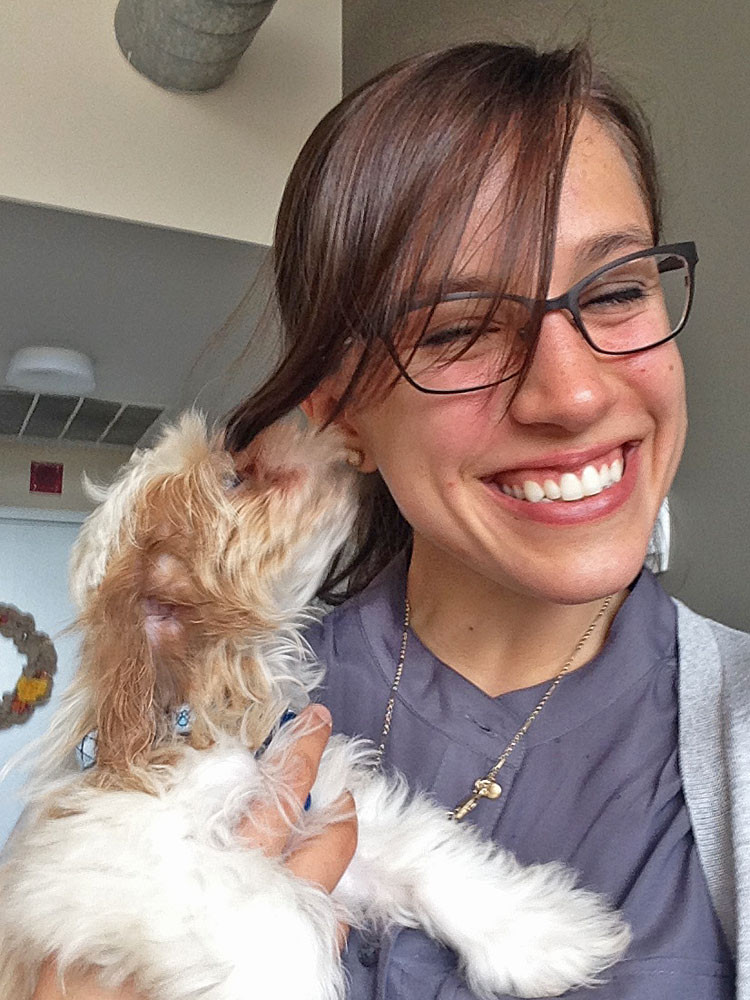 Havanese puppy Charlie Brown shares a kiss and a secret with his best-est buddy, Katie