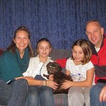 The Laverys with their daughters and new Havanese puppy